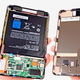 Illustration for article titled Watch the Kindle Fire's Guts Dissected